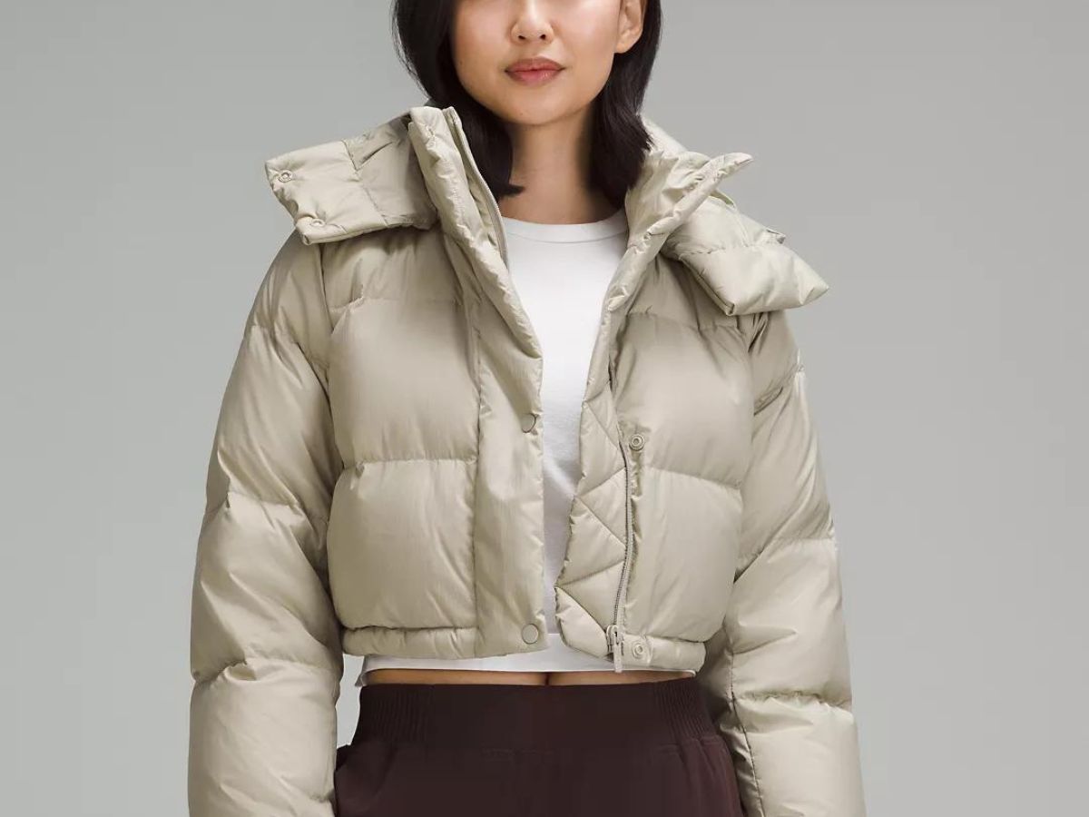woman wearing beige short puff jacket