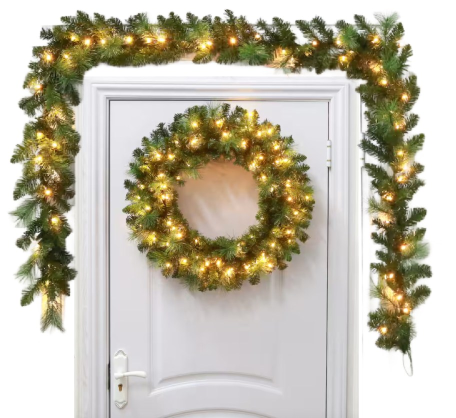 lighted wreath and garland over door