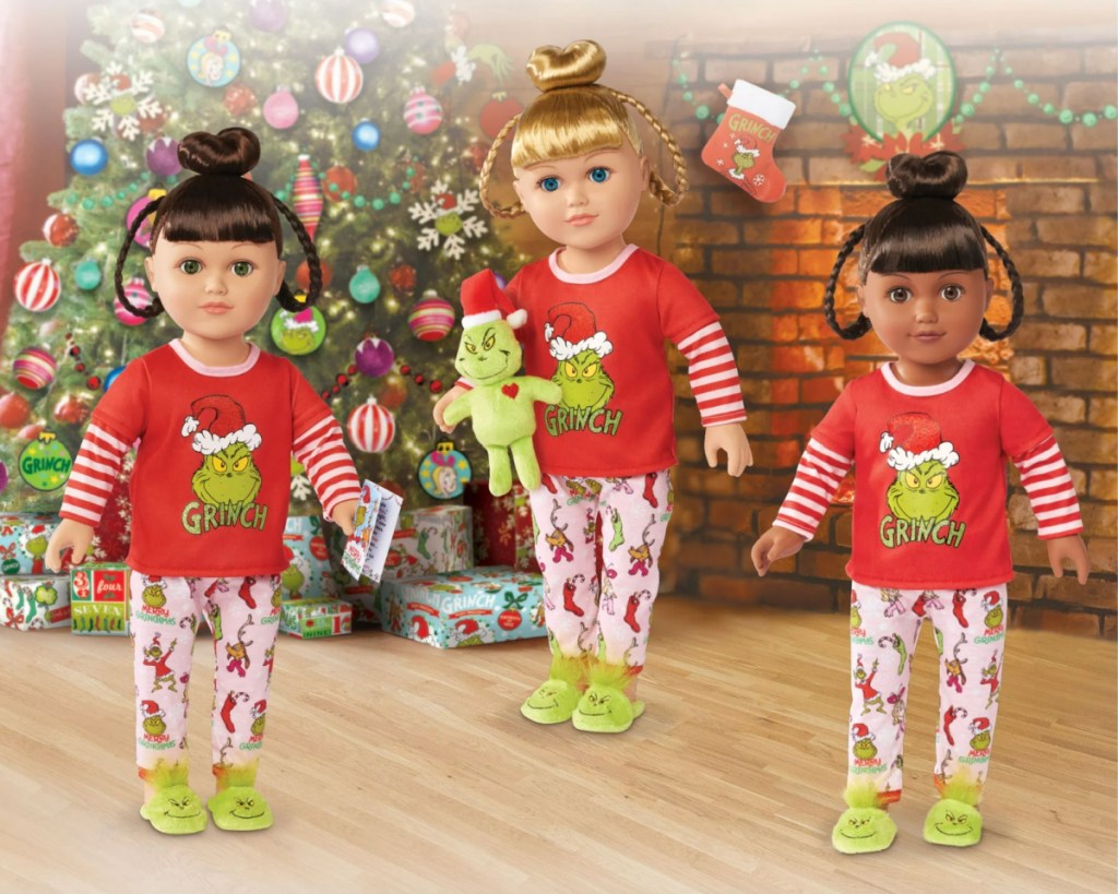three dolls with grinch jammies