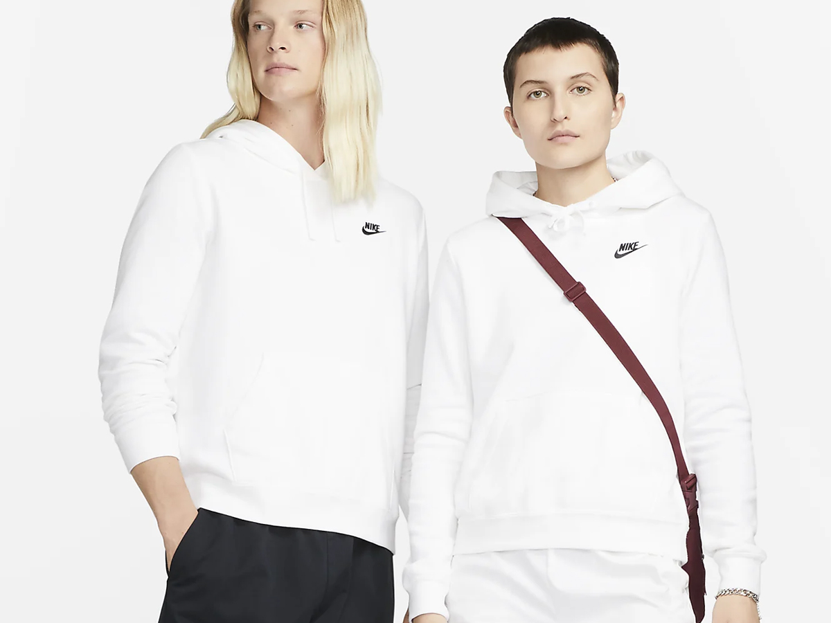 man and woman wearing white nike hoodie