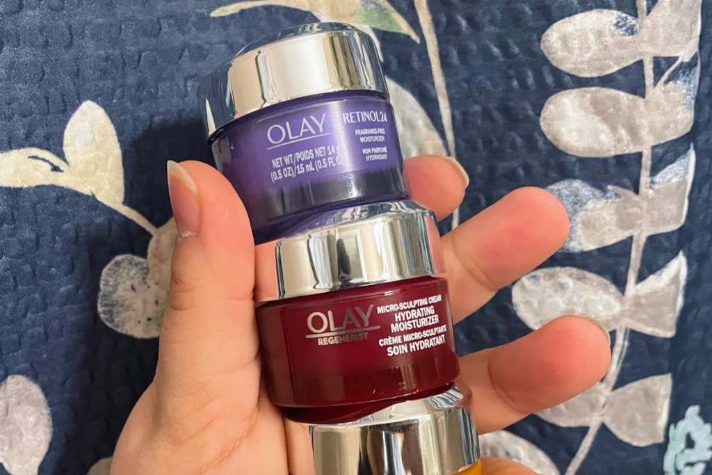 mini retinol and regenerist moisturizers in hand