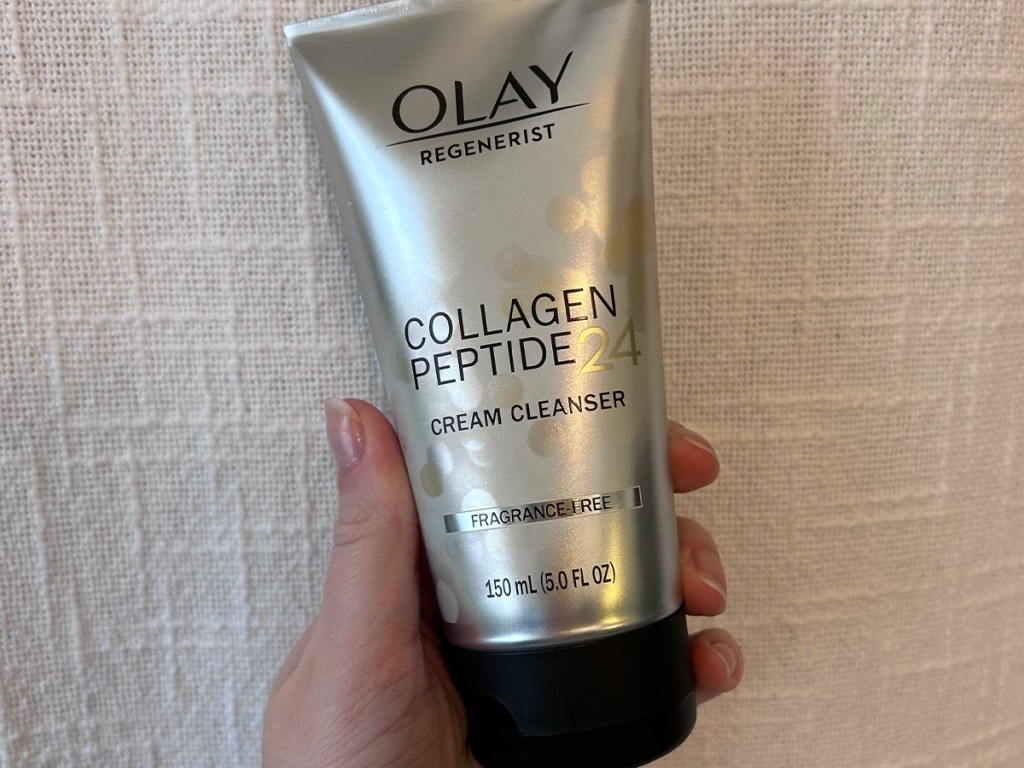 hand holding olay collagen peptide cleanser