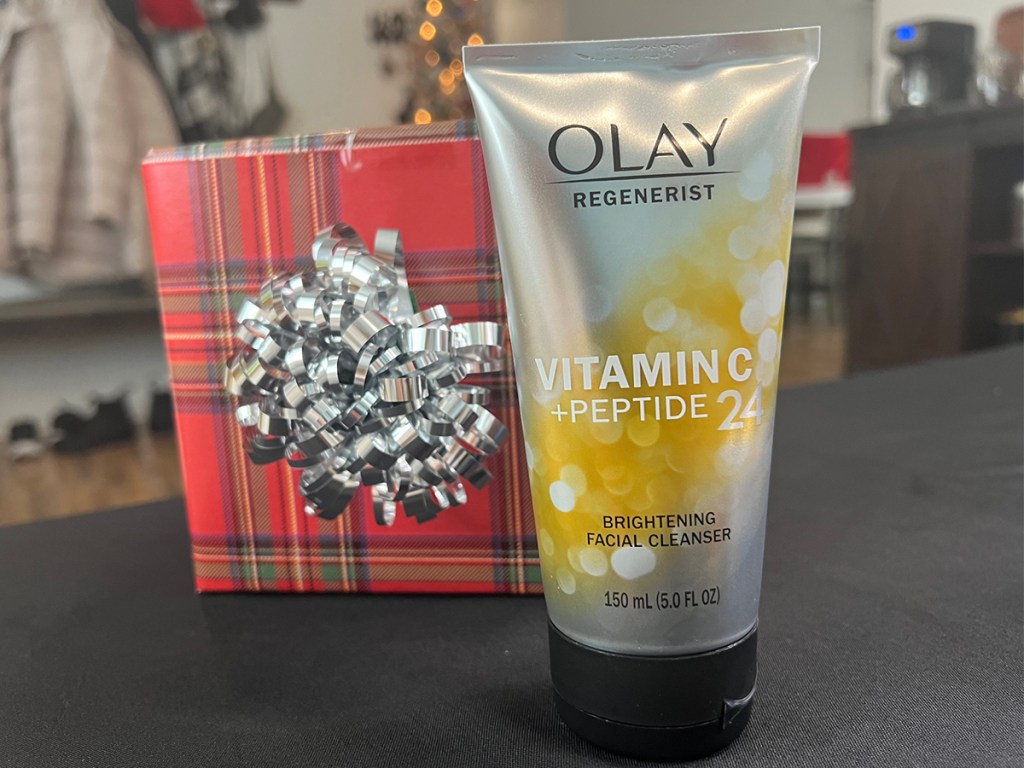 olay vitamin c peptide cleanser next to christmas gift box
