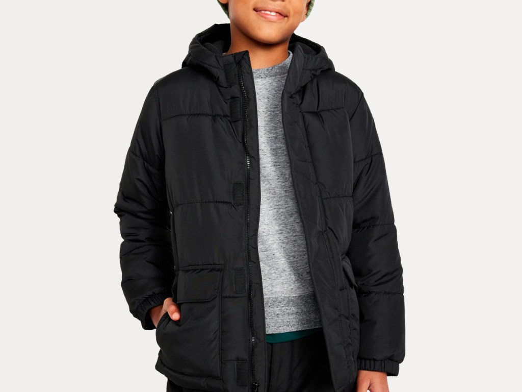 boy wearing black jacket