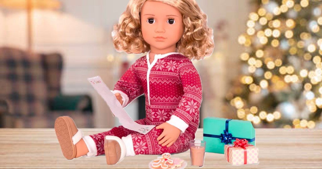 blonde our generation doll in red pajamas with christmas list and present toys