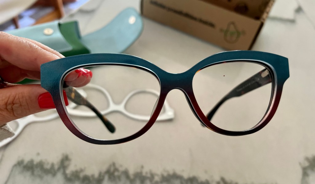 teal to brown gradient frame toppers on glasses
