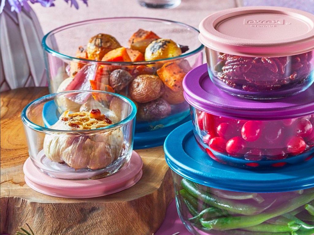 glass pyrex set with food inside them on table