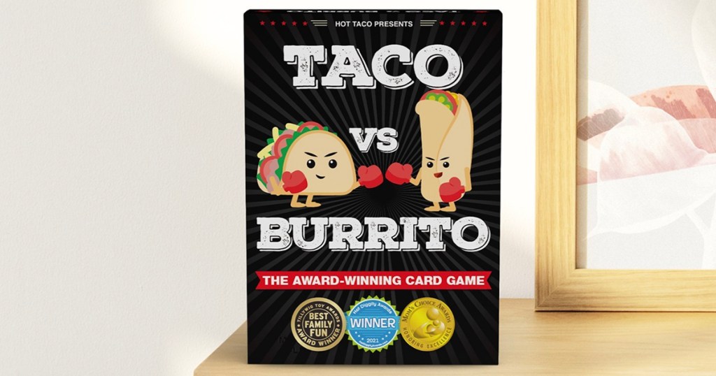 taco vs burrito card game on table