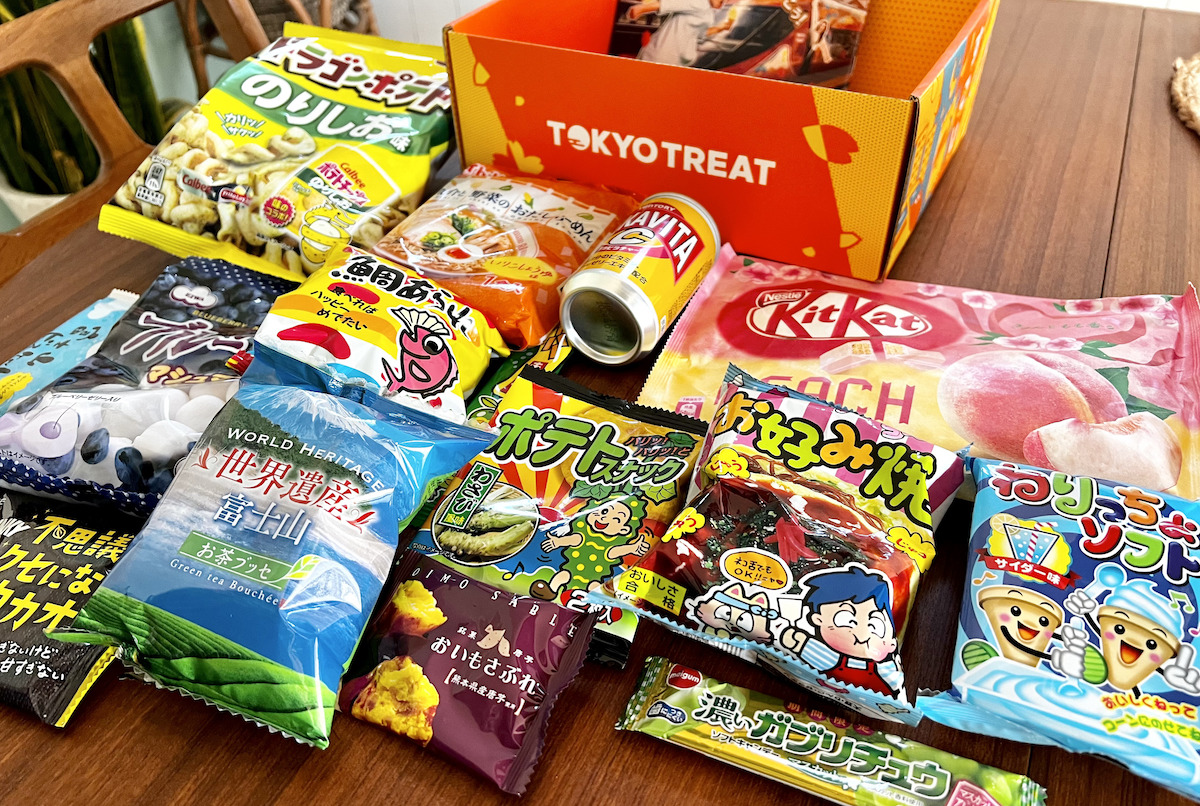 Various foreign snacks, laying on the table with Tokyo treat box 