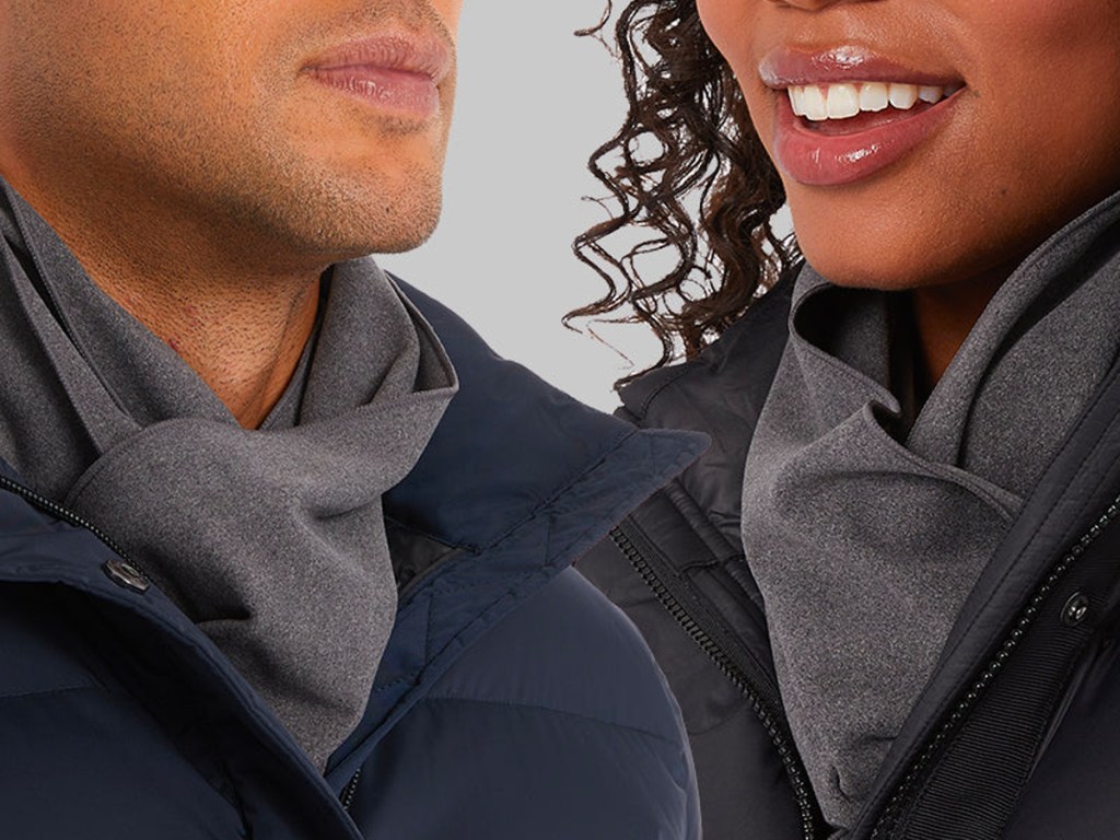 man and woman wearing gray scarf