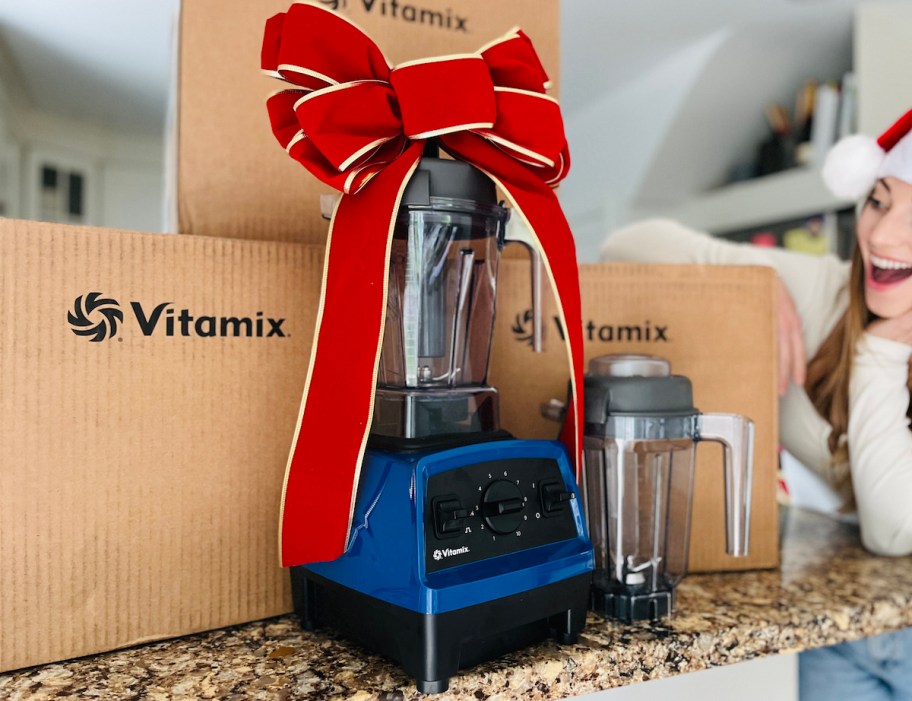 blue vitamix blender on countertop with boxes