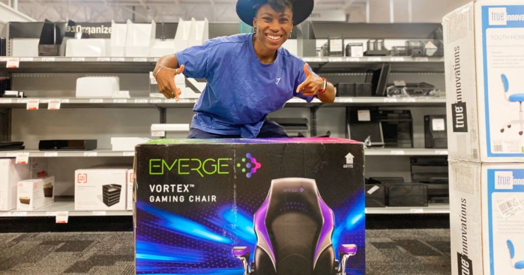 person standing over Emerge Vortex gaming chair