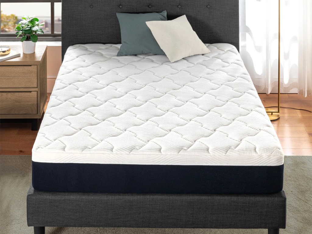 zinus foam mattress on gray bedframe in bedroom