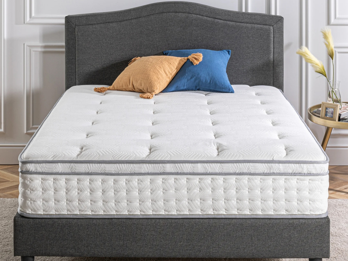 zinus mattress on gray bedframe