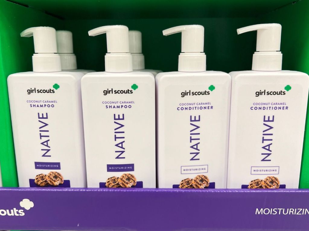 Native Girl Scouts Coconut Caramel Shampoo and Conditioner bottles on shelf at Target