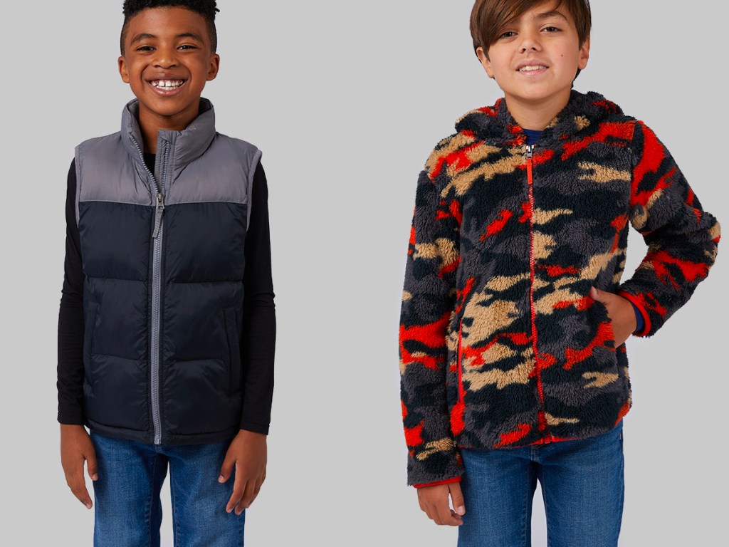 two boys wearing black vest and camo sherpa jacket