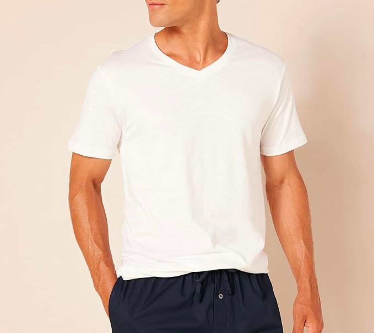 a male model wearing an Amazon Essentials Men's V-Neck Undershirt