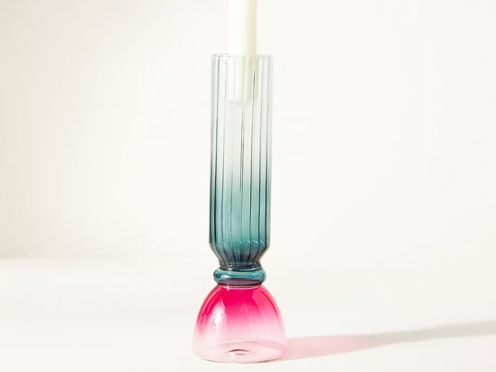 clear, pink, and blue candle stick holder