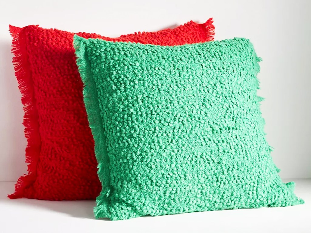 red and green textured throw pillows