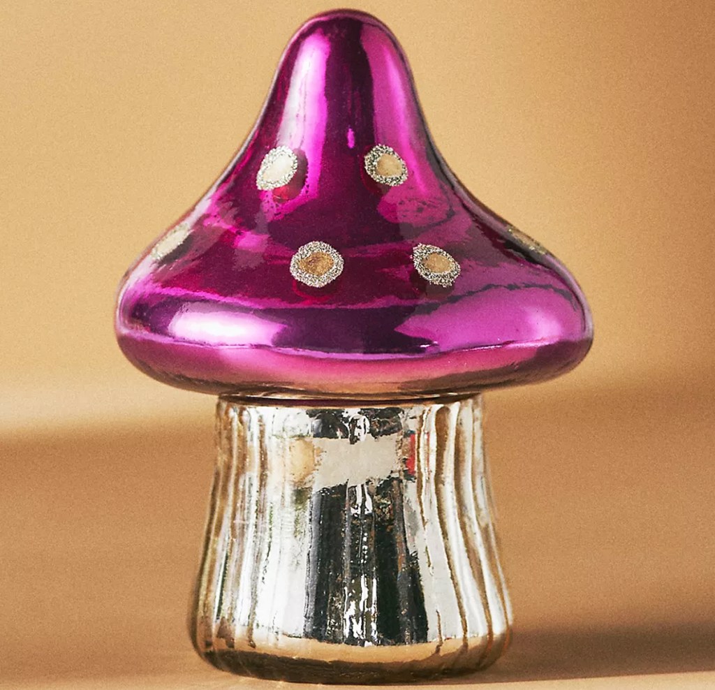 shiny pink mushroom-shaped candle