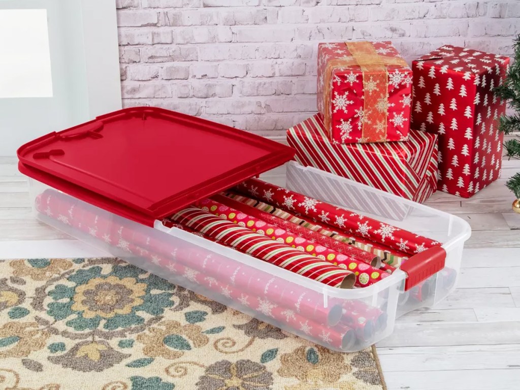 thin storage container with wrapping paper rolls inside
