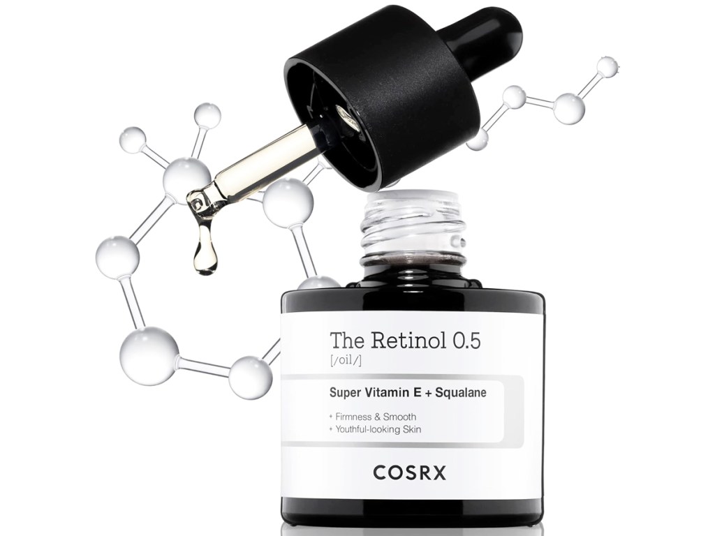 opened black and white bottle of COSRX Retinol