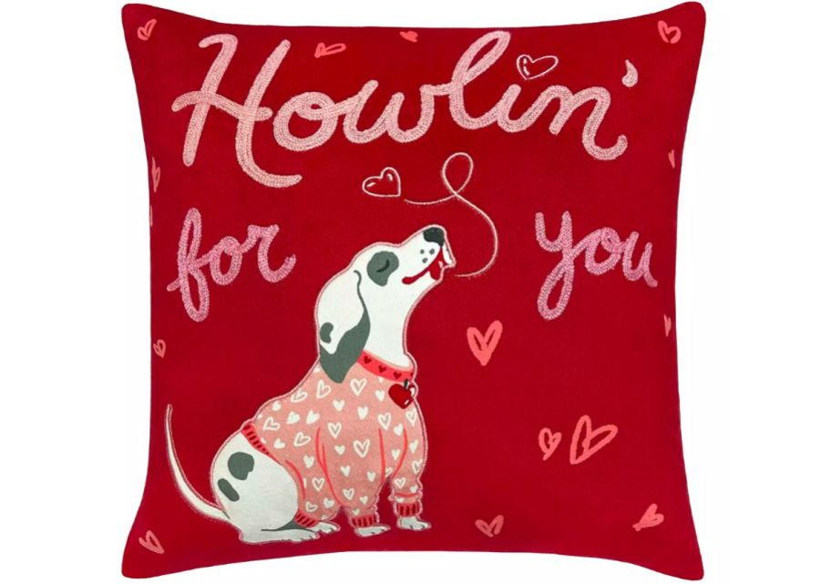 a red square pillow with a dog on it and the words howlin for you embroidered above the dog
