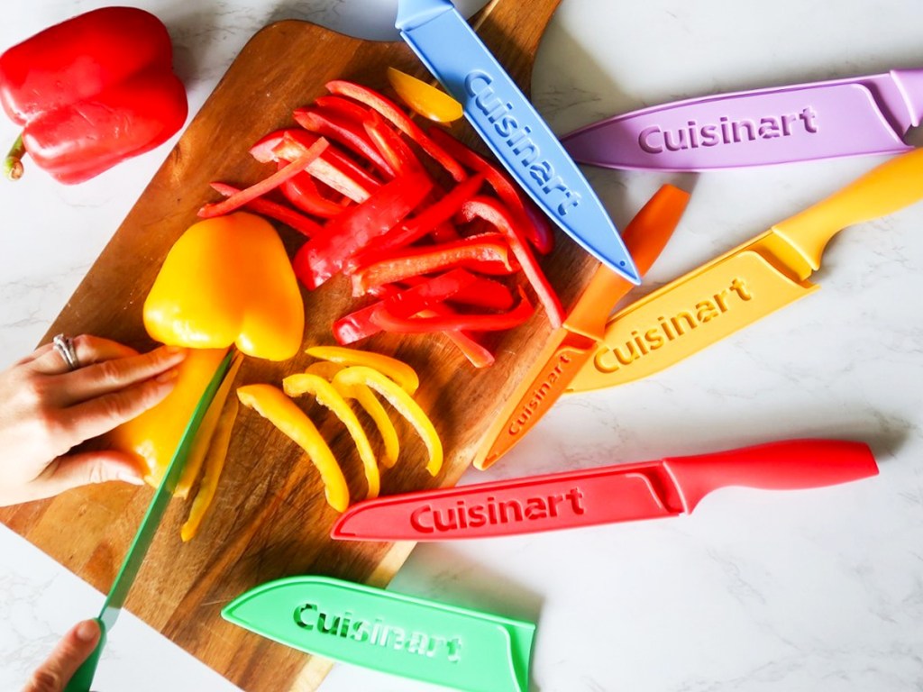 person chopping bell peppers with colorful Cuisinart knife set