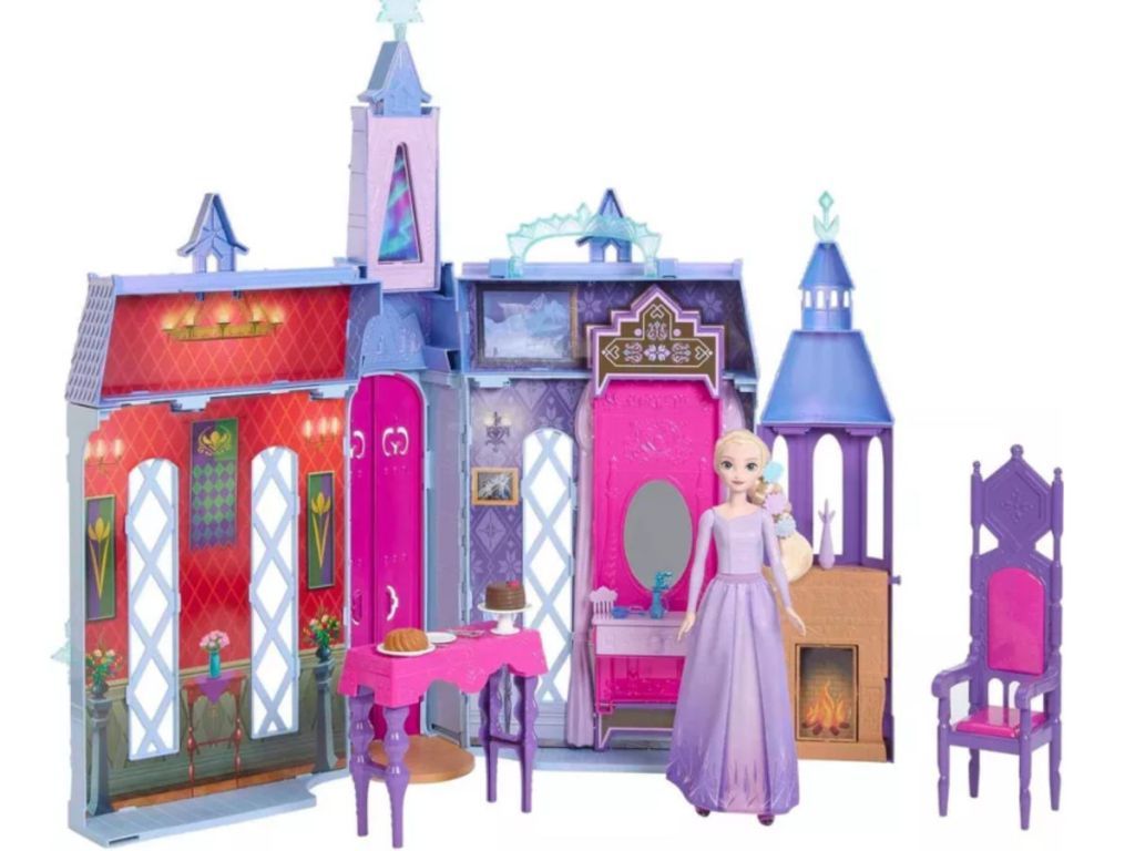 toy castle with doll in front