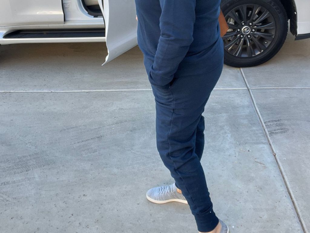 woman wearing blue sweatpants