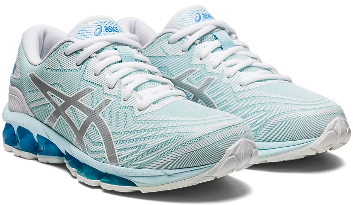 light blue sneakers with a silver asics logo