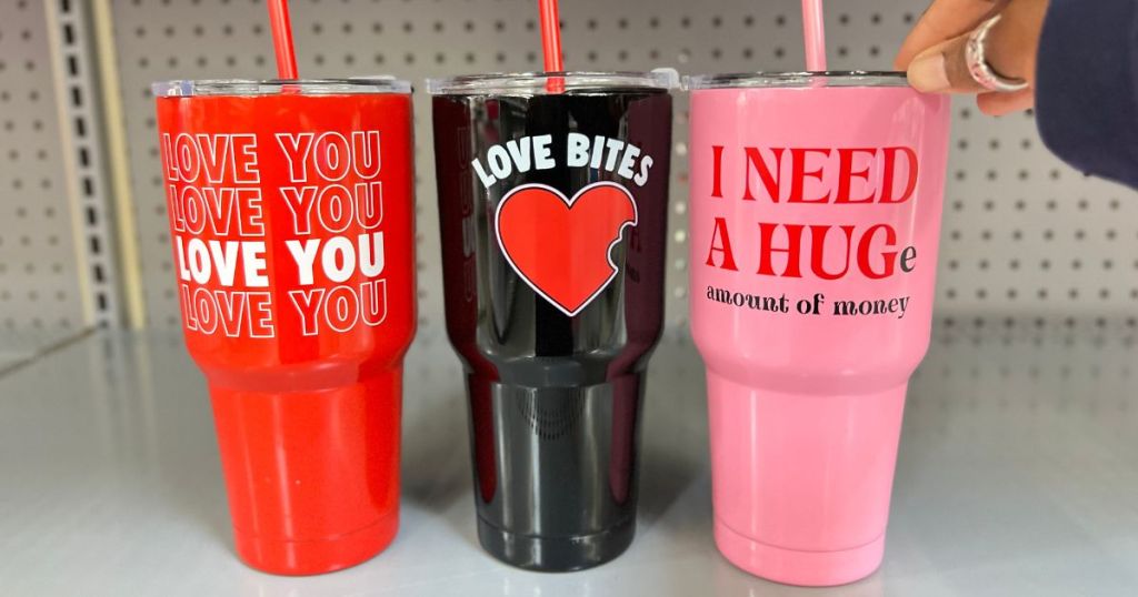 Valentine's Day themed stainless steel tumblers on shelf at Walmart