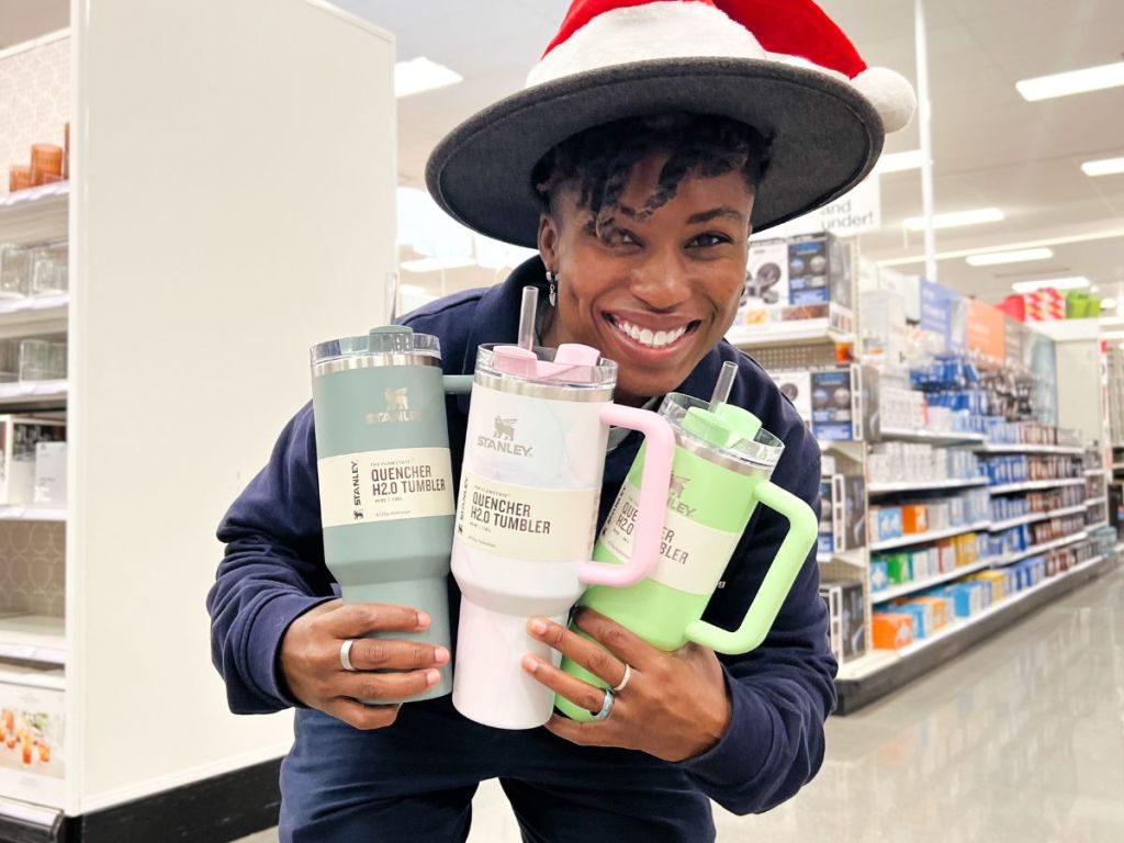 Cam holding new Stanley tumblers at Target