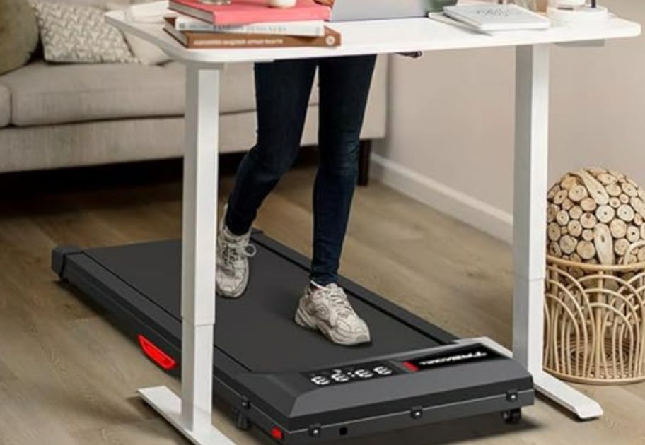 woman walking on an Under Desk Smart Treadmill