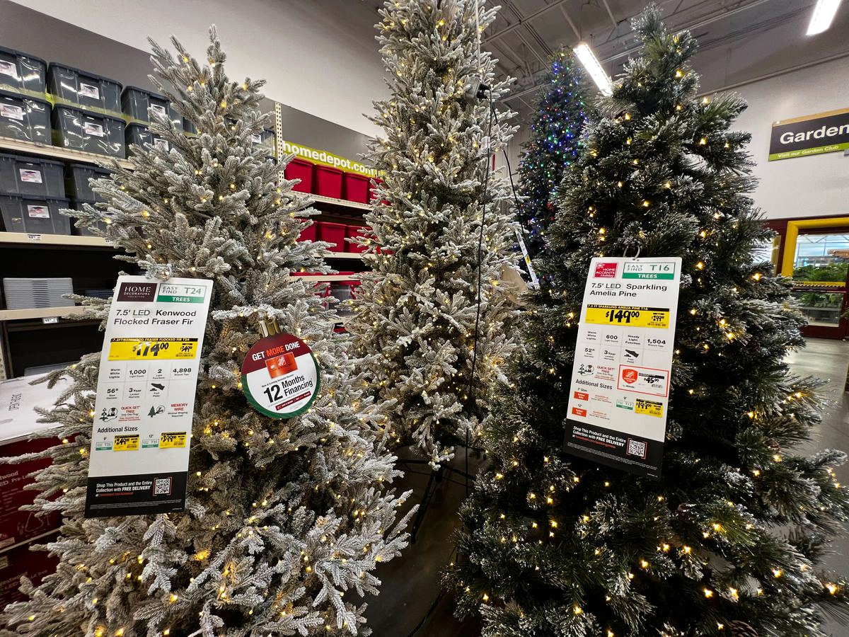 two christmas trees on clearance at home depot