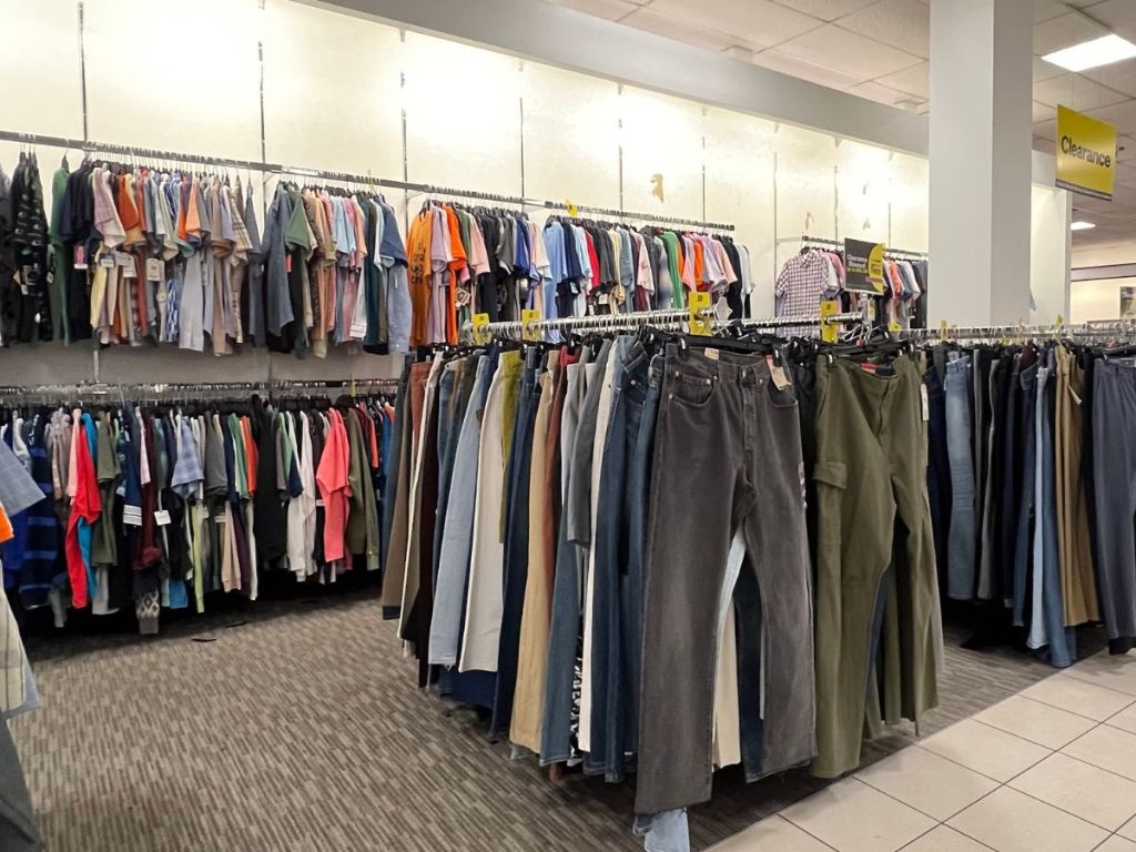 racks of men's clearance clothing at JCpenney