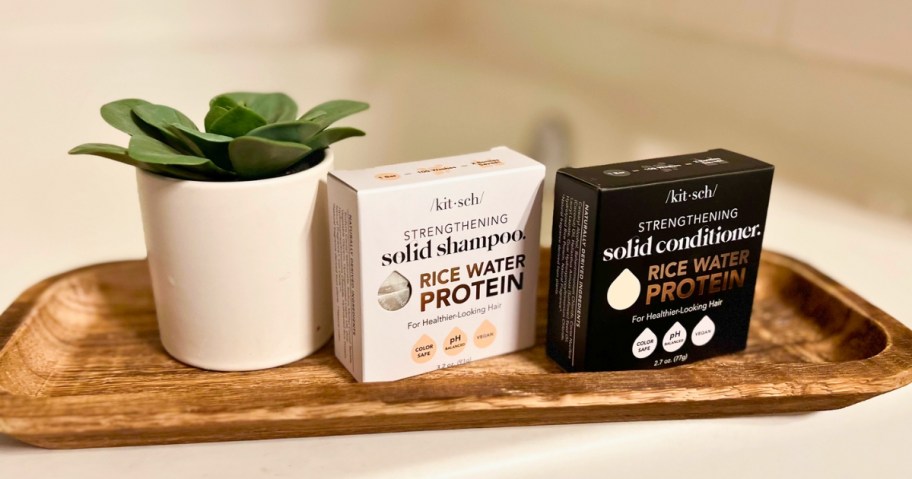 Kitsch Rice Water Shampoo & Conditioner Bar 2-Pack on wooden tray in bathroom