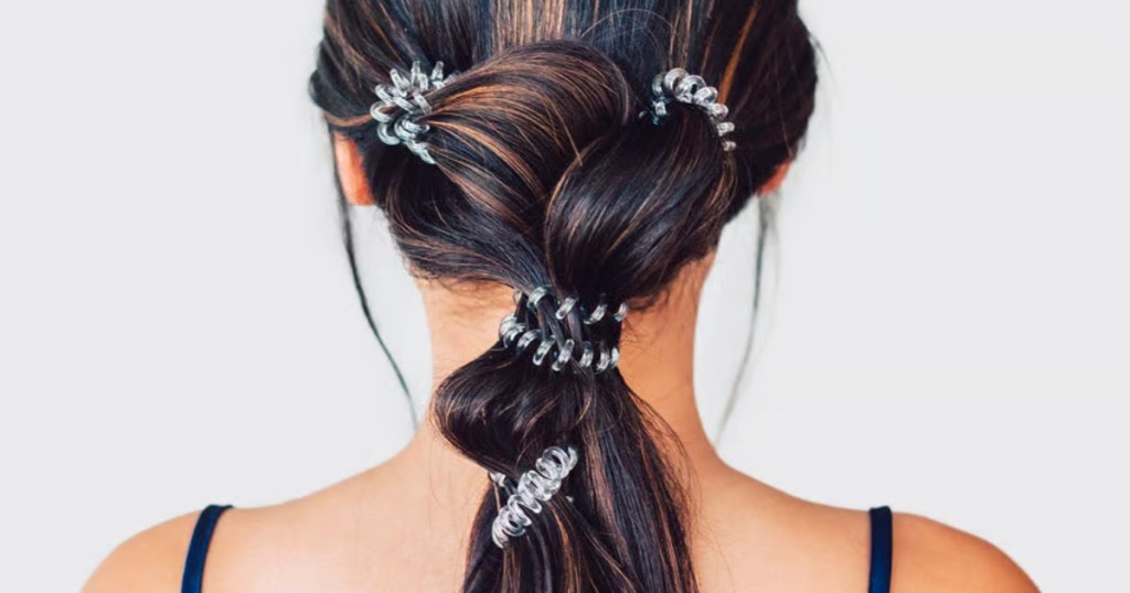 woman wearing kitsch spiral hair ties in hair