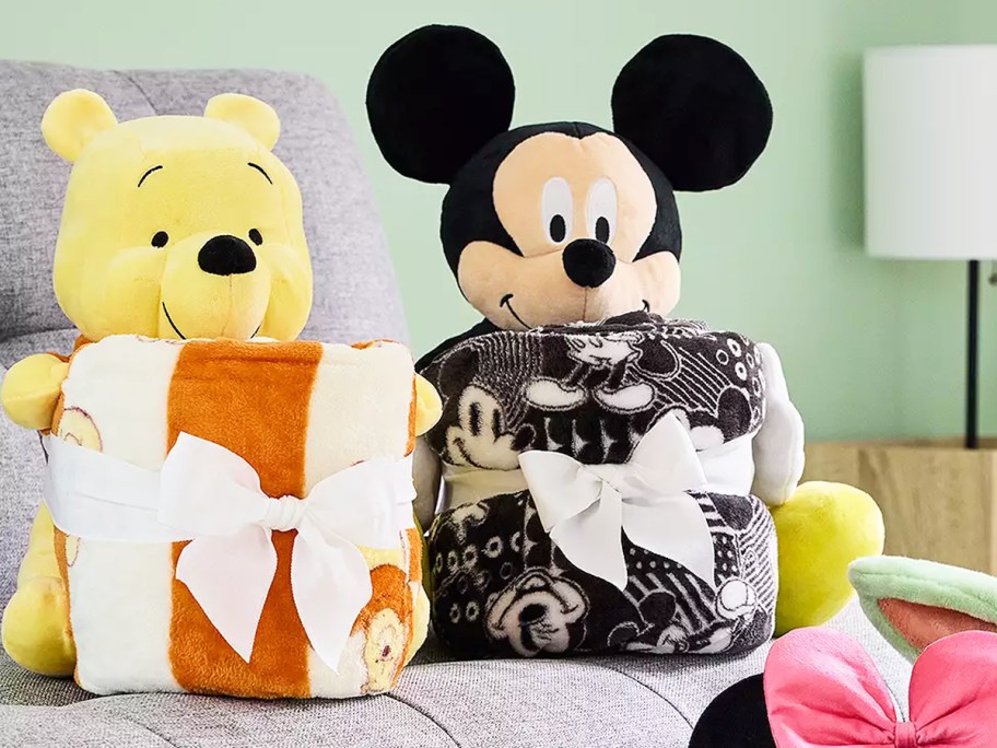 Winnie The Pooh & Mickey Mouse buddy and throw blanket sets on couch