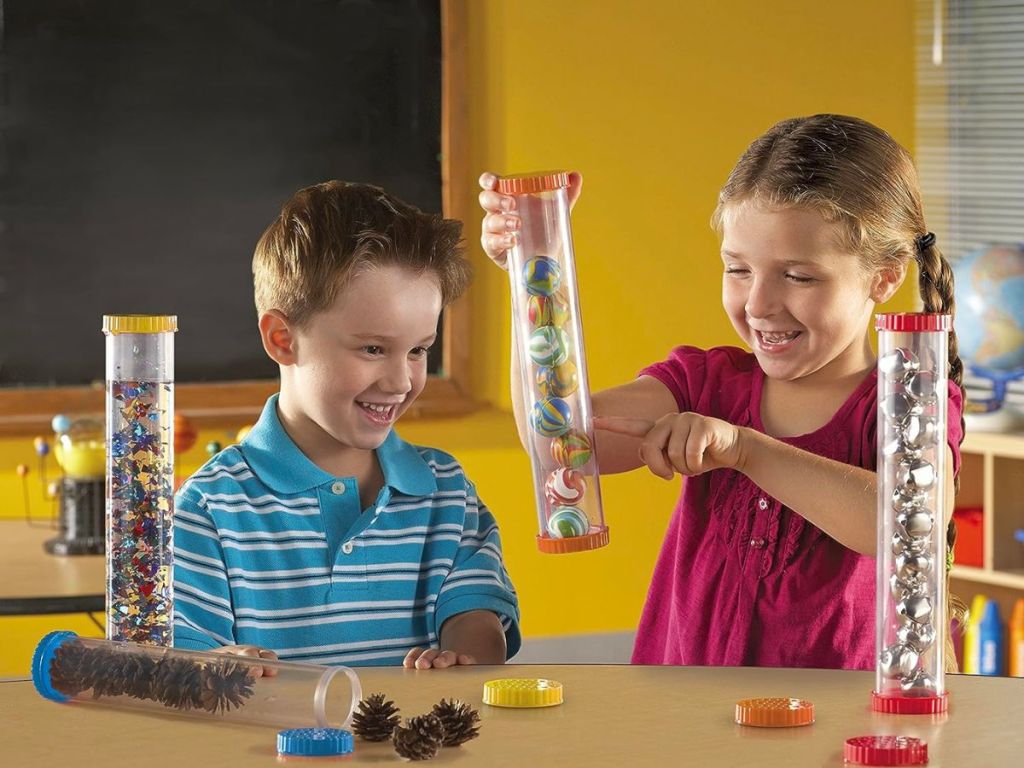 two kids playing with Learning Resources Primary Science Sensory Tubes - Set of 4 2