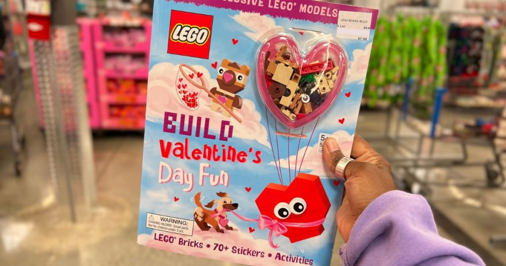 Hand holding a LEGO valentine book