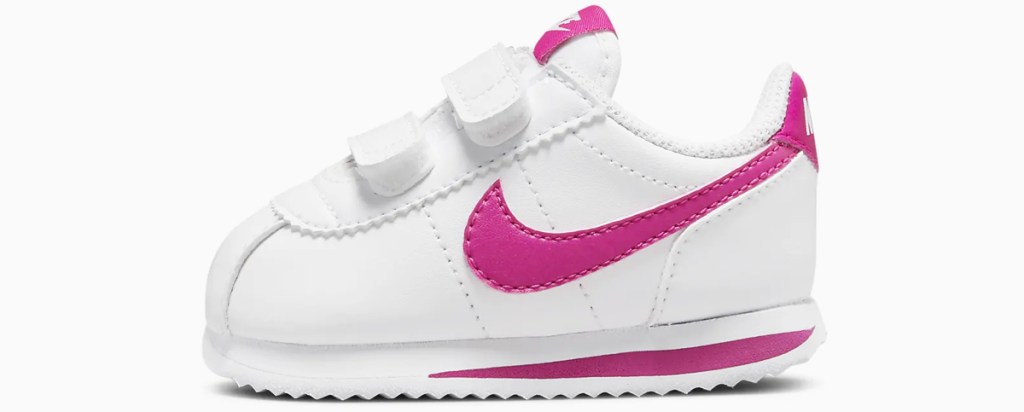 white and pink nike baby shoe