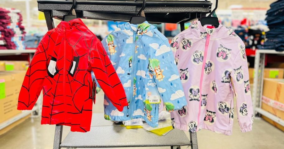 Sam's Club Character Kids Hooded Rain Jackets hanging in store