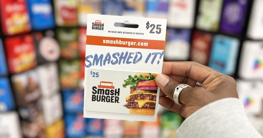 hand holding up a Smashburger Gift Card