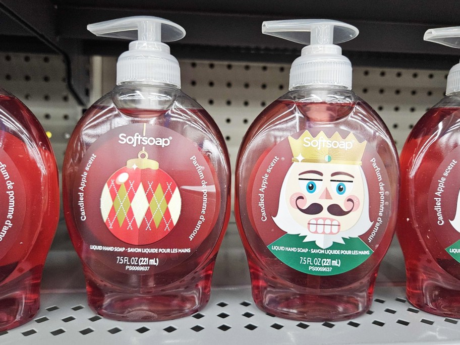 red bottles of christmas softsoap hand soaps on store shelf