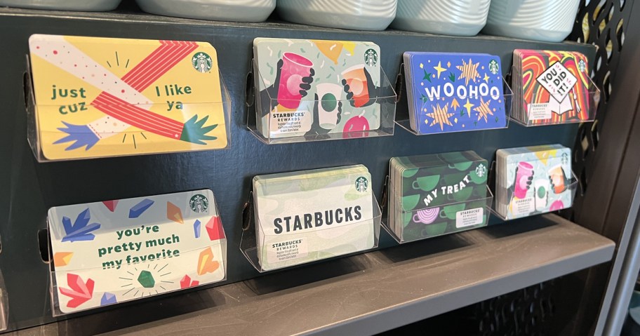 display of various Starbucks gift cards in store