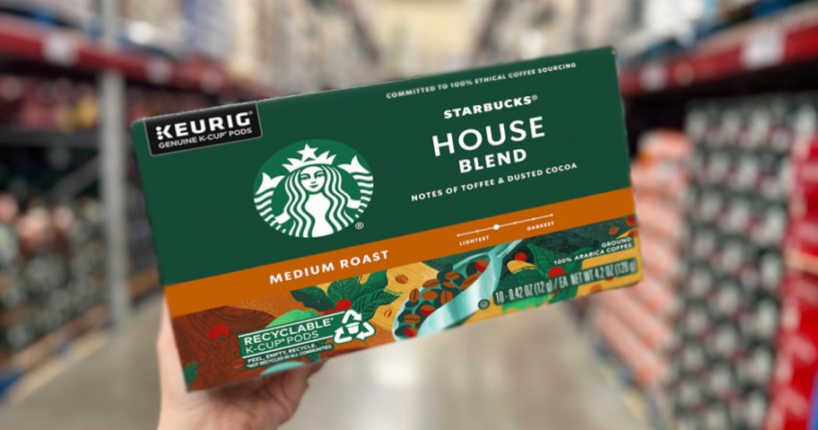 hand holding up a large box of Starbucks House Blend K-Cups in store