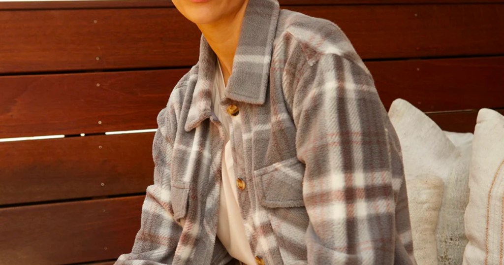 woman wearing plaid shacket in gray