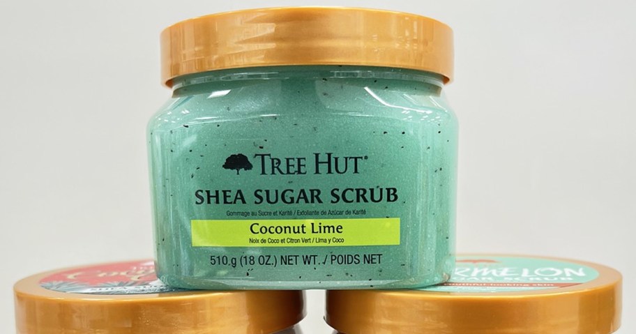 green jar of Tree Hut Sugar Scrub in Coconut Lime scent