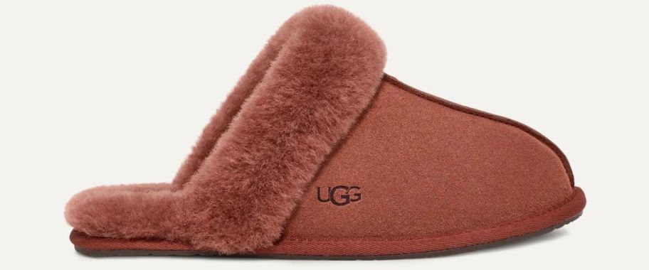 A reddish-brown UGG shoe